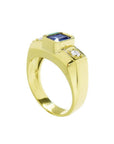 Men's 14K yellow gold ring with an emerald cut blue sapphire and two round side diamonds.
