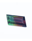Front position of a loose Brazilian watermelon tourmaline bicolor red orange and green bluish, table and crown visible.
