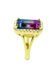 The pink and green of this tourmaline ring are visibles fron the top to side down split shank profile.
