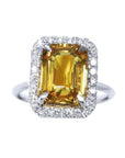 Yellow sapphire ring emerald cut halo natural diamonds 14K white Gold, with a vivid, crystalline yellow hue.