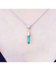 Colombian emerald briolette necklace with a diamond slider on a 14K white gold chain.