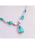 USA made women's emerald necklace for sale natural diamonds pear shaped complemented with a wheat style