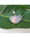 9.30 ct. Ethiopian opal necklace pendant with red-orange fire, handcrafted in 14K yellow gold.