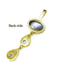 Back-side of a 14K yellow gold pendant with an oval black and white Australian opal and two teardrop accents.