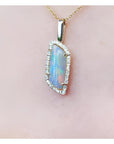 14K yellow gold opal and diamond pendant necklace with a colorful Australian opal.