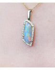 14K yellow gold opal and diamond pendant necklace with a colorful Australian opal.