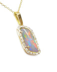 14K yellow gold pendant necklace with a rectangular Australian opal and diamond halo.