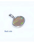 Back of 2.25 ct Australian opal pendant in 14K white gold, showing solid semitransparent white crystal.