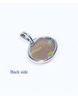 Back of 2.25 ct Australian opal pendant in 14K white gold, showing solid semitransparent white crystal.