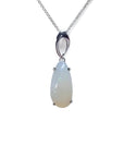 Pear-shaped white opal solitaire pendant in 14K white gold on a delicate chain.