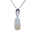 Pear-shaped white opal solitaire pendant in 14K white gold on a delicate chain.