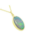 Oval-cut 3.41 ct Australian opal pendant with green-bluish rainbow play, set in 14K yellow gold.