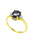 14K yellow gold ring with a 0.87 ct. oval blue sapphire and two natural diamonds on each side.