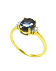 14K yellow gold ring with a 0.87 ct. oval blue sapphire and two natural diamonds on each side.