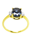 14K yellow gold women's ring with oval blue sapphire and two side diamonds.