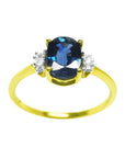 14k yellow gold women's blue sapphire ring 0.87 ct. oval cut, it is elegantly complemented by two natural diamonds on each side.