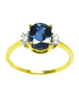 14k yellow gold women's blue sapphire ring 0.87 ct. oval cut, it is elegantly complemented by two natural diamonds on each side.