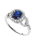 Blue sapphire ring for women September's birthstone Halo Diamonds 14K White Gold, tilted top view down profile