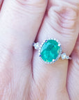 Brides' emerald jewelry May birthstone ring medium deep green color 2.02 carats halo natural diamonds crafted in 14k white gold