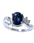Oval cut natural bue sapphire ring for women 14k white gold, sparkling deep blue color prong set, with accent natural diamonds.