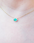 Oval cut east wes orientation Emerald necklaces from Muzo mines Colombia halo natural diamonds, crafted in 14k yellow gold