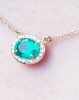 Colombian Emerald necklaces for women from Muzo mines Colombia halo natural diamonds, crafted in 14k yellow gold