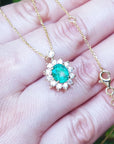 Genuine Colombian Emerald necklaces natural Muzo mine oval cut 1.11 carats encircled by halo diamonds crafted in 14k yellow gold