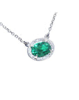 Women's Oval cut emerald necklace east west orientation halo natural diamonds prong set crafted in 14k white gold