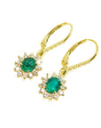 Pair of a yellow gold oval cut emerald halo diamond earrings lever backs