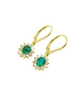 14K gold oval cut emerald earrings with diamond halo and lever backs.