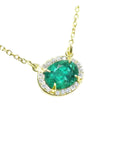 Oval cut emerald necklace for women from Muzo mines Colombia halo natural diamonds, in 14k yellow gold