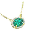 Oval cut emerald necklace for women from Muzo mines Colombia halo natural diamonds, in 14k yellow gold