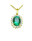 Oval 3.01 ct. natural emerald pendant with halo diamonds in 18K yellow gold.
