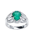 Oval cut natural colombian emerald ring with accent diamonds in 18k white gold.