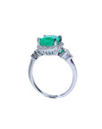 14K white gold halo ring with a 2.02 ct oval-cut deep green emerald and natural diamond accents.