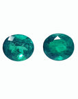 Oval cut matched pair loose natural emeralds 1.60 ct. front side table and crown view