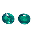 Oval cut matched pair loose natural emeralds for a unique design of emerald earrings.
