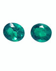Oval cut matched pair loose natural emeralds for a unique design of emerald earrings.