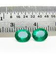 Oval cut matched pair loose natural emeralds 1.60 ct. front side table and crown view with ruler sizer