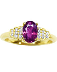 Ladies' oval ruby rings, natural diamonds in 14k yellow gold, front top view, showing main stone and shoulders