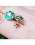 18K yellow gold Colombian emerald and diamond cluster earrings, flower-shaped.