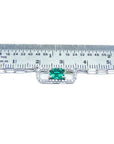 Emerald paper clip necklace with diamonds in 18K white gold, shown with ruler for scale.
