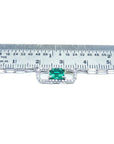 Emerald paper clip necklace with diamonds in 18K white gold, shown with ruler for scale.