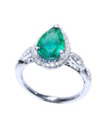 Emerald and diamond engagement ring bridal style pear cut engagement halo diamond milgrain deco 14k white gold