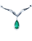 emerald necklace for lady's pear cut 1.28 carats sourced from Muzo mines encircled by a halo diamond crafted in 14k white gold