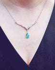 natural diamond Emerald necklaces pear cut 1.28 carats sourced from Muzo mines, halo diamond crafted in 14k white gold