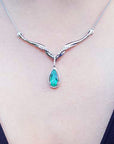 Ladies Emerald necklaces USA made pear cut 1.28 carats, Muzo mines encircled by a halo diamond crafted in 14k white gold