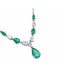 Natural Emerald necklace and diamonds pear shaped in 14k white gold individual settings with a wheat style chain