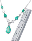 Colombian Emerald necklaces natural diamonds pear shaped linked in 14k white gold settings with a wheat style chain