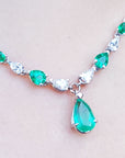 Women's emerald necklace natural diamonds pear shaped in 14k white gold settings complemented with a wheat style chain